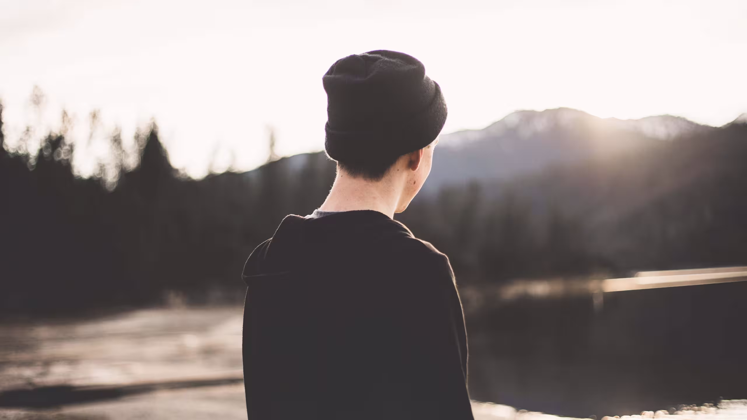 man wearing a black beanie hat