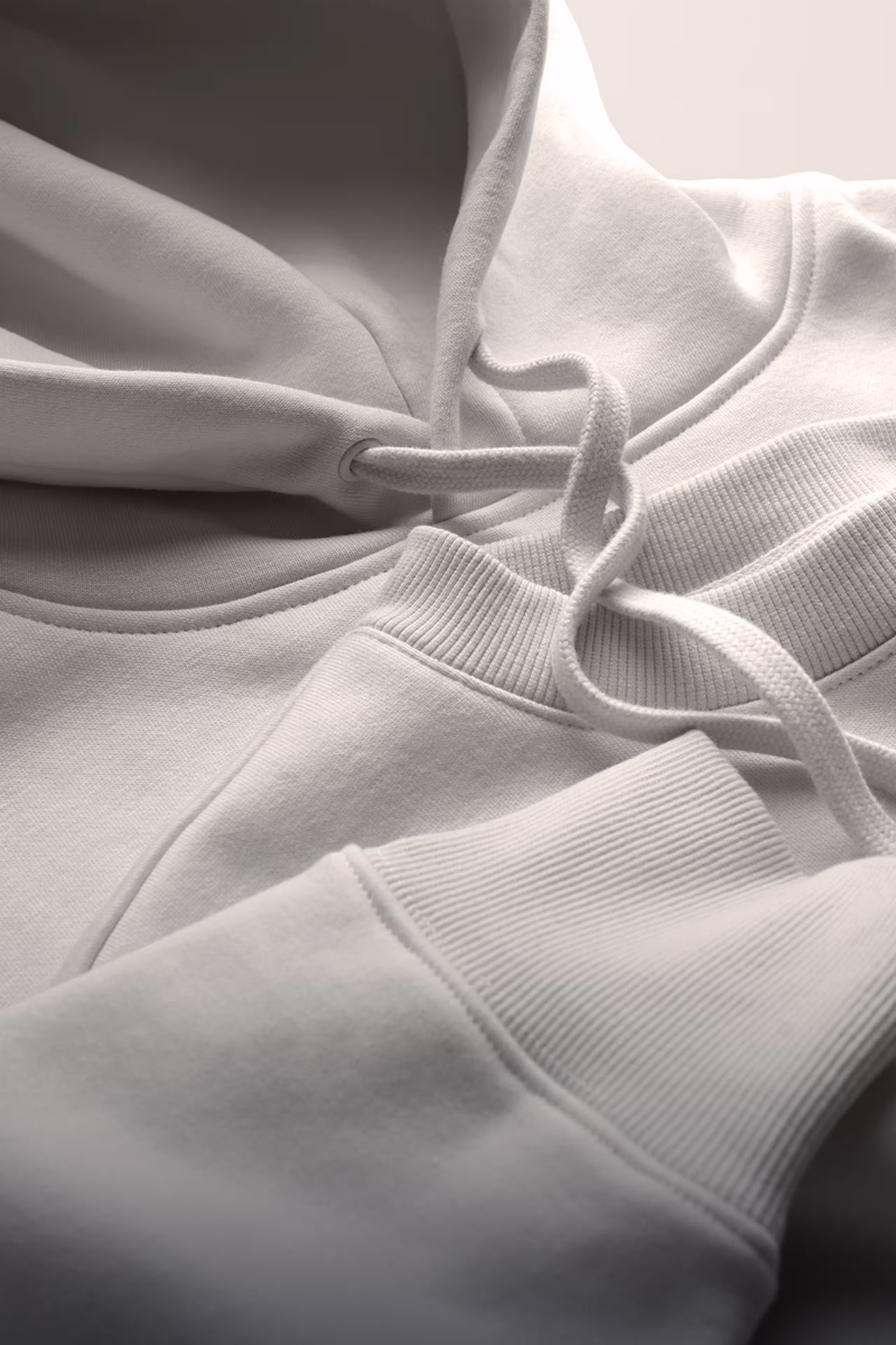 Hoodies and Crewneck sweatshirts laying flat on top of each other