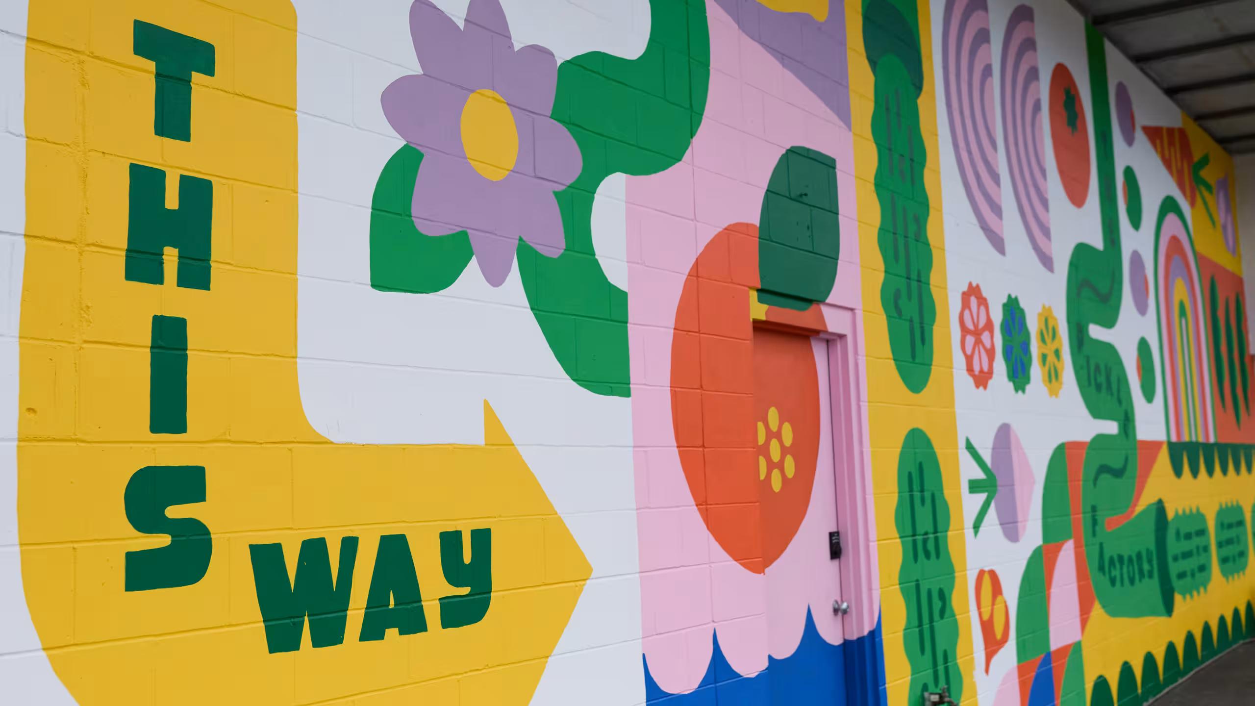outside mural at the Pickle Factory