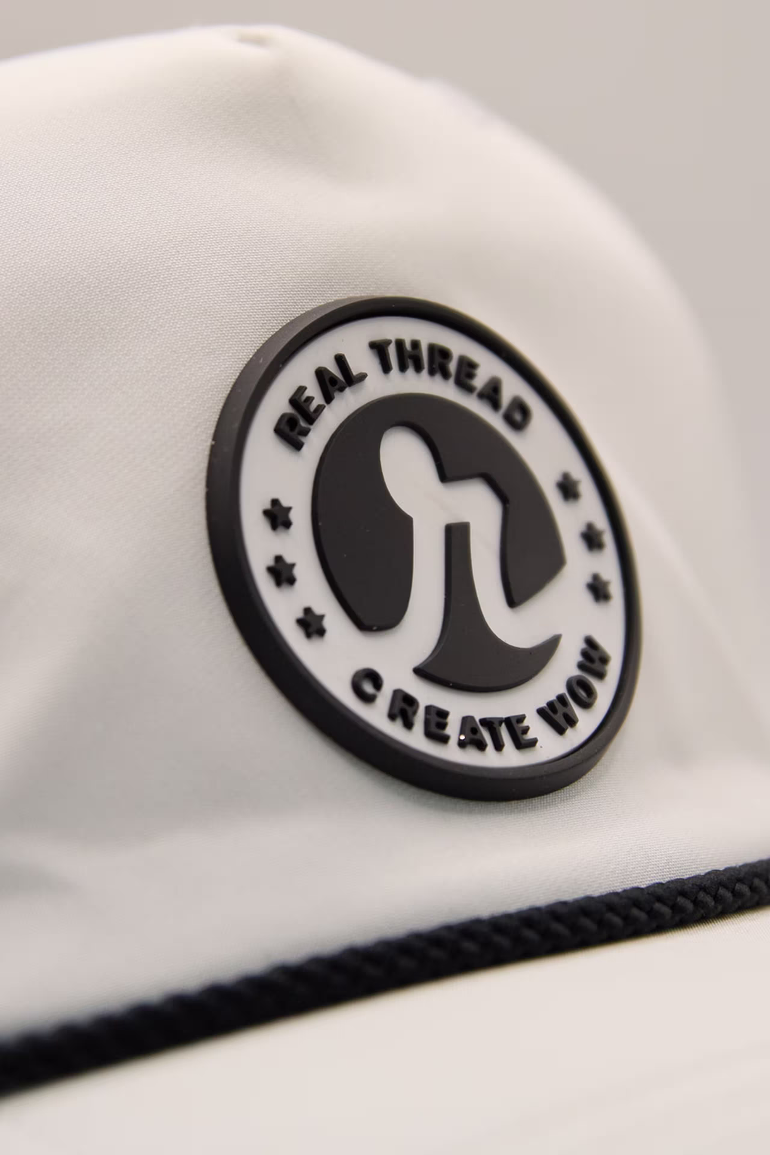 close up of the real thread molded patch on a white hat