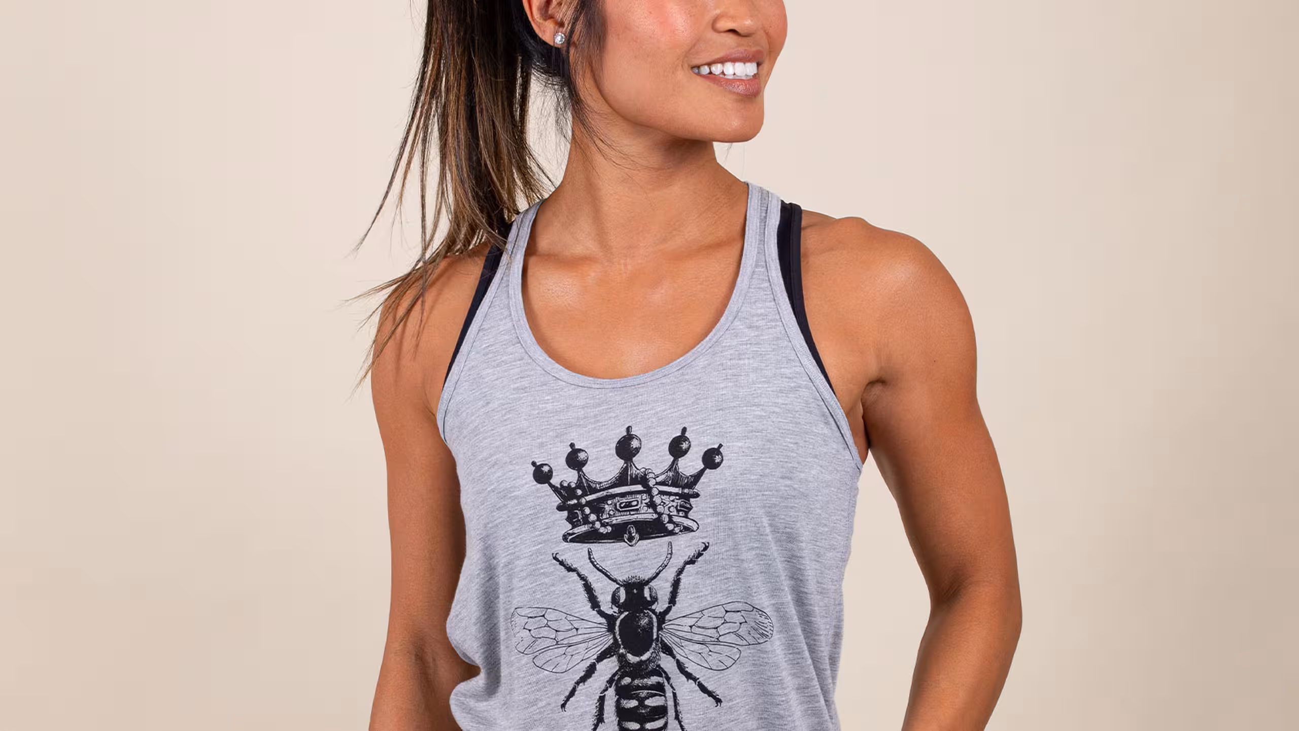 women wearing a gray athletic tank top