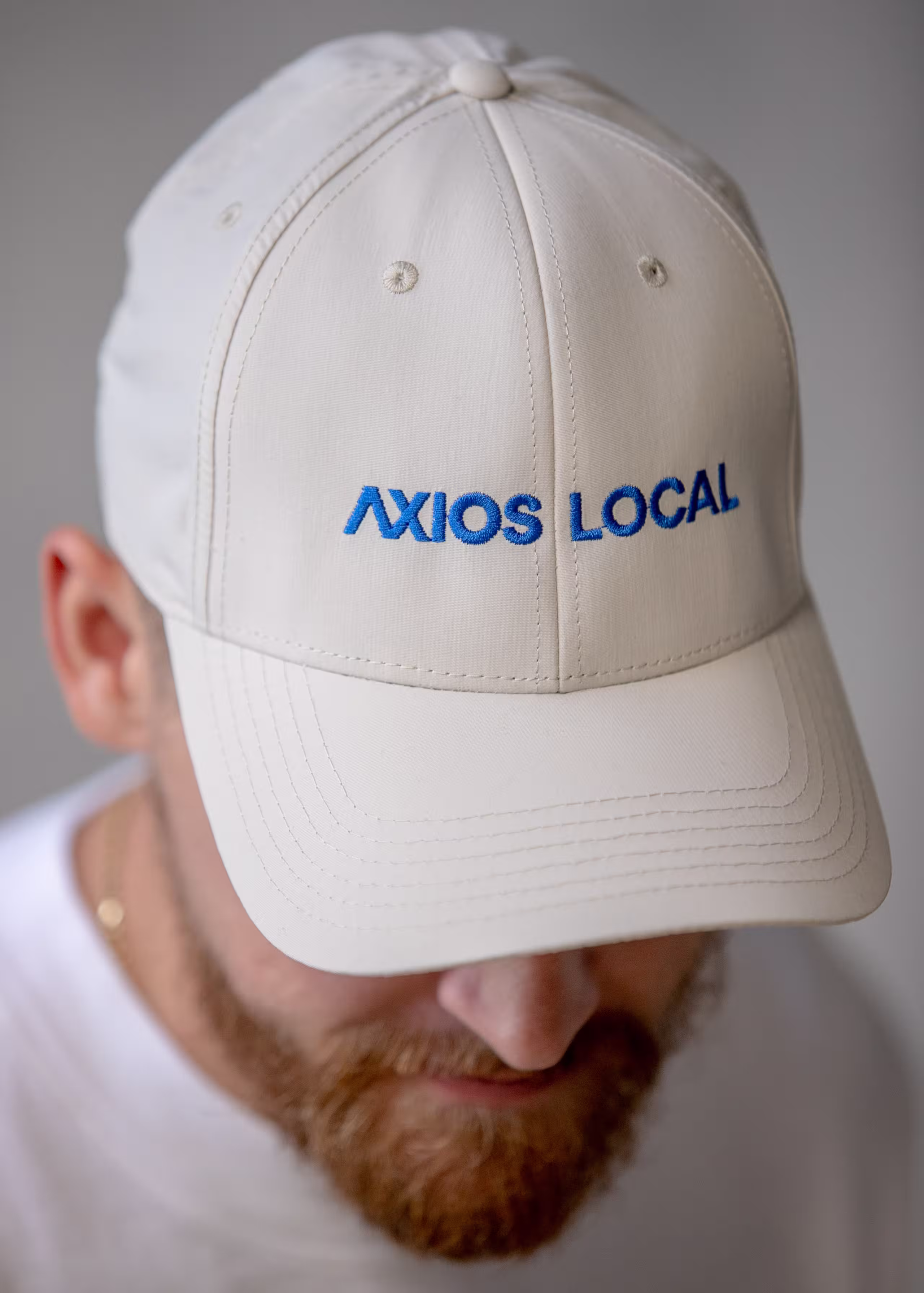 man wearing a white hat