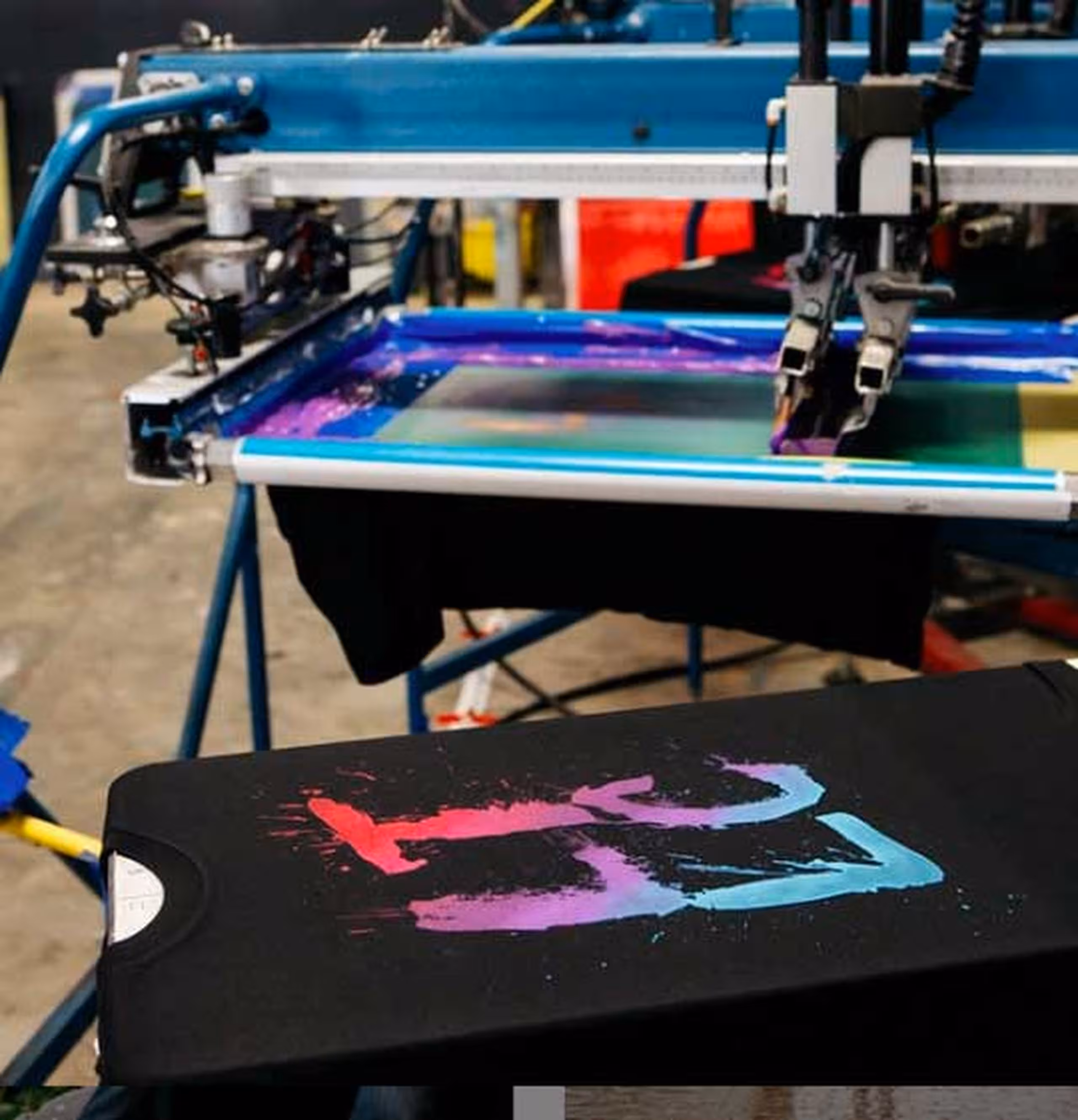 black t-shirt on a press