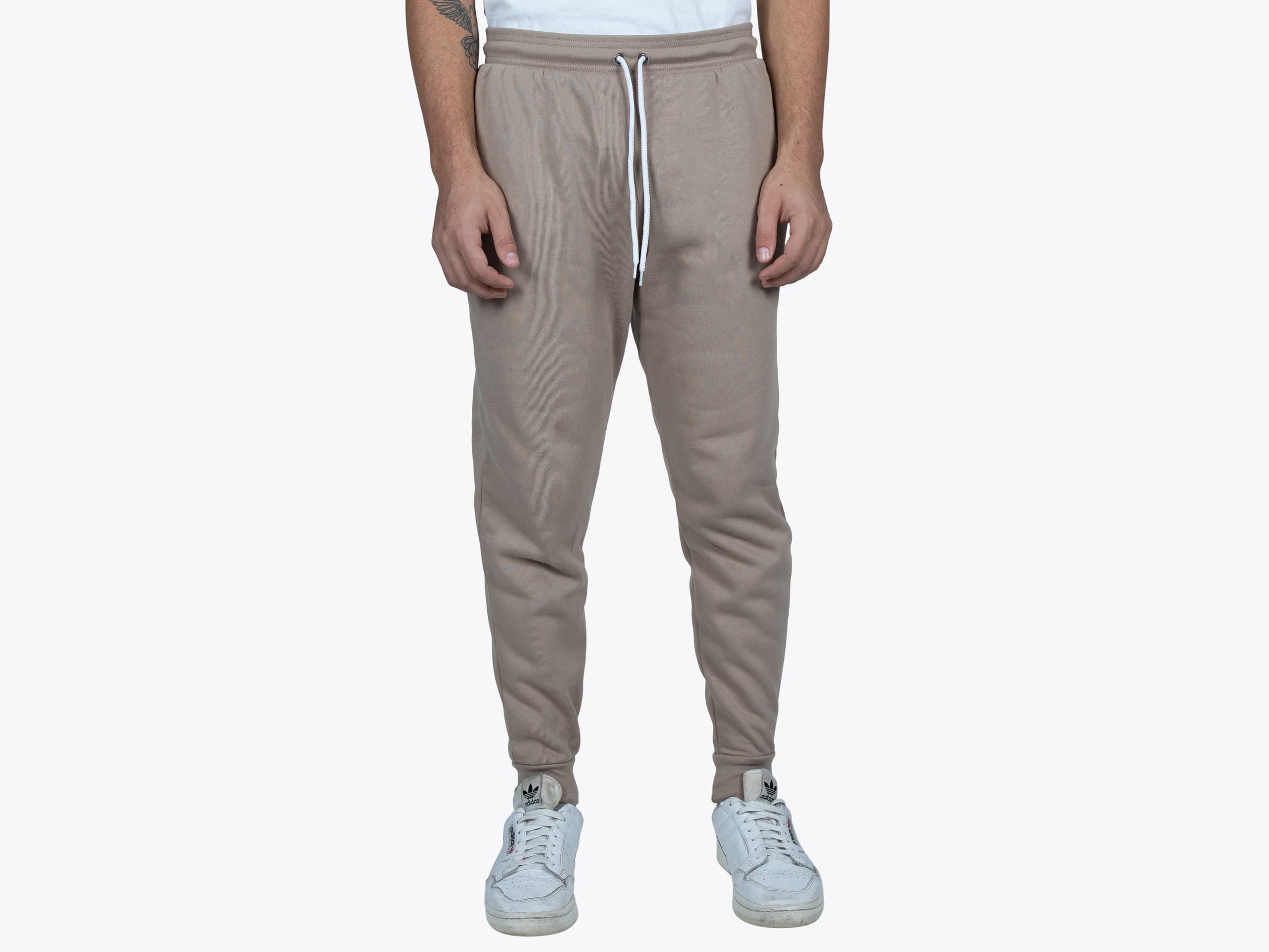 Bella+Canvas 3727 Unisex Jogger Sweatpants in Tan (model:male, size:medium, view:front)